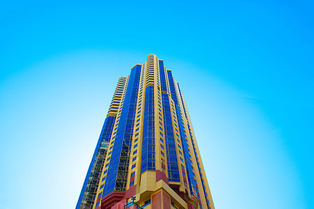 brown and blue high rise building thumbnail