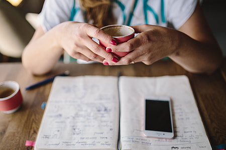 Young woman working in a cafe thumbnail