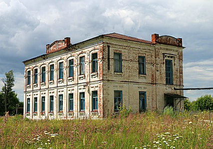 architectural photography of brown building thumbnail