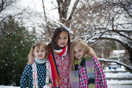 three girls wearing sweater thumbnail