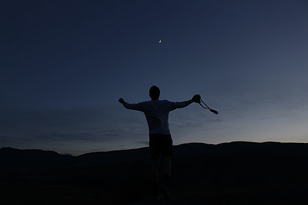 silhouette of man during night time thumbnail