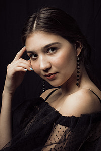 women in black off-shoulder tops thumbnail