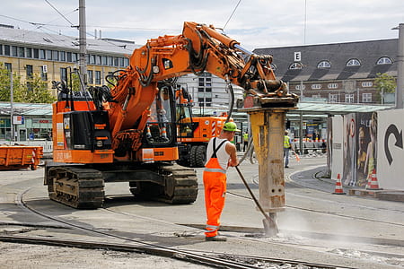 man operating jack hammer thumbnail