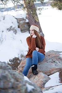 woman sitting on rock thumbnail
