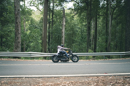 person riding motorcycle on road thumbnail