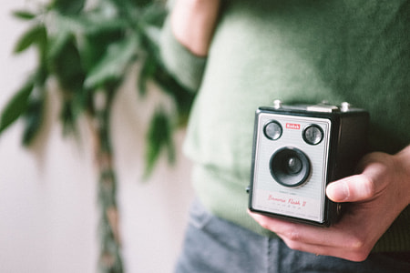 Guy with a vintage Kodak camera thumbnail