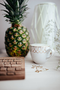 Wooden keyboard and cup of coffee thumbnail