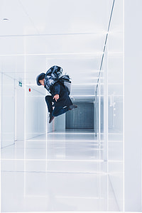 man jumping in the middle of hallway thumbnail