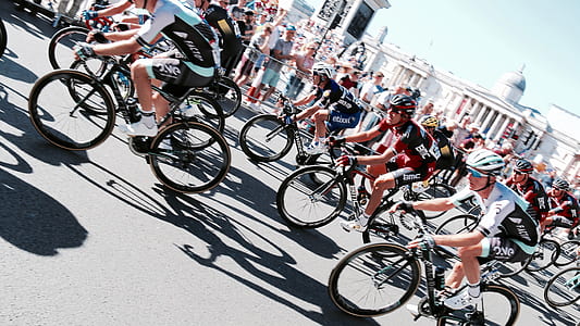 people on road bike racing against each other thumbnail
