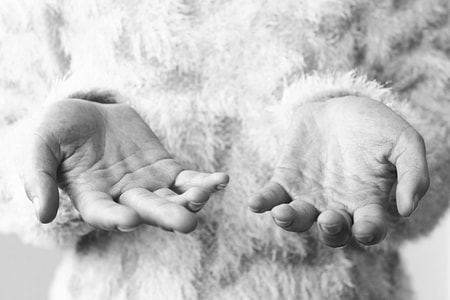 grayscale photo of person hands thumbnail