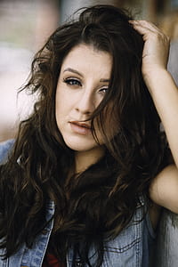 woman wearing blue denim button-up vest thumbnail