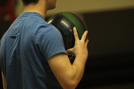 man holding ball thumbnail