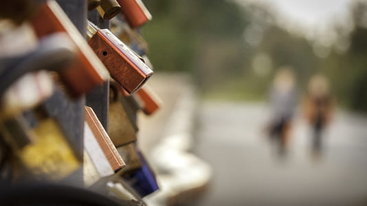 selective focus of padlocks during daytime thumbnail