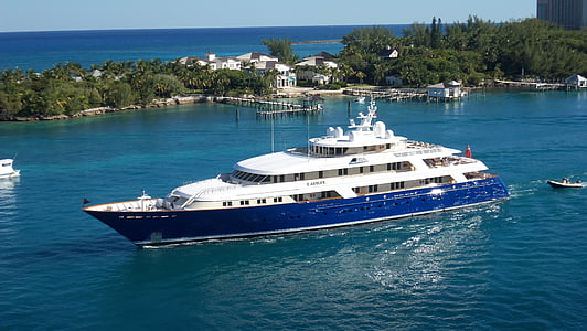 photo of white and blue cruiser ship during daytime thumbnail
