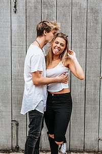 man hugging woman kissing on head thumbnail