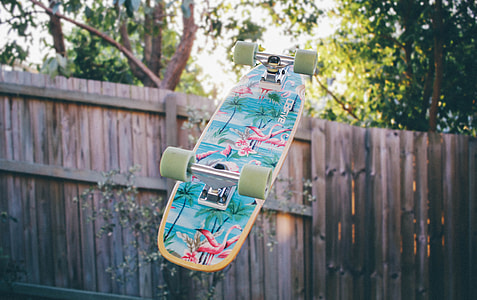 throwing skateboard to fence thumbnail