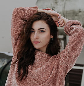 woman wearing red knit sweater thumbnail