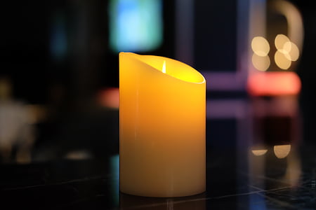 turned-on pillar candle thumbnail