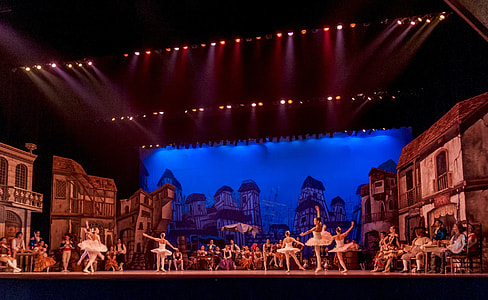 ballerina dancing on theater stage thumbnail