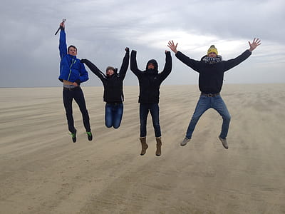 five men jumped on desert thumbnail