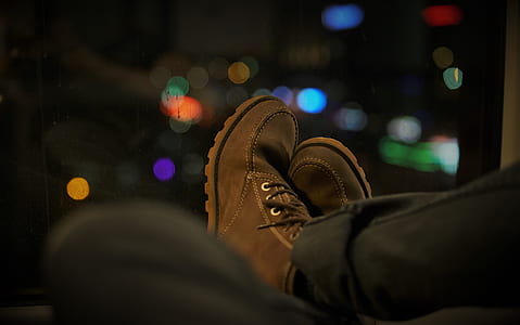 selective focus photo of person wearing brown shoes thumbnail