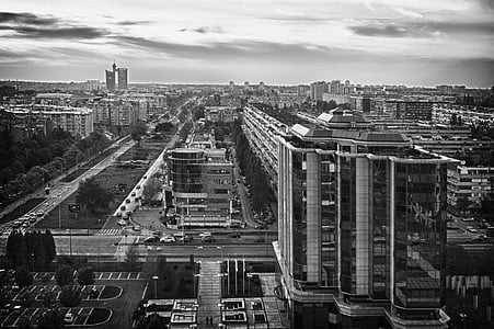 city building in greyscale photography thumbnail