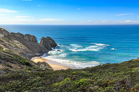 blue beach under blue sky thumbnail