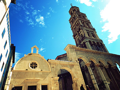 low angle photography of gray concrete church thumbnail
