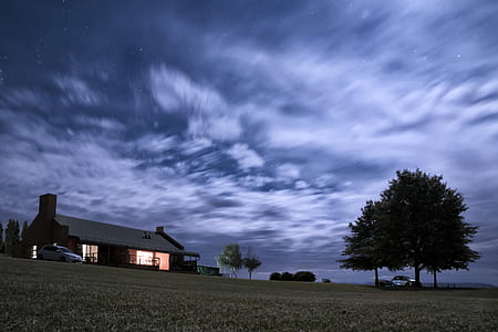 landscape photograph of house near tree thumbnail