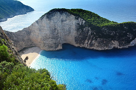 brown and grey island with blue sea thumbnail