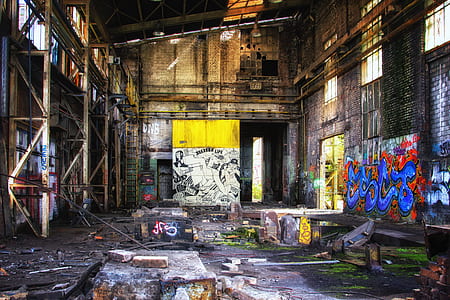 empty warehouse filled with graffiti thumbnail