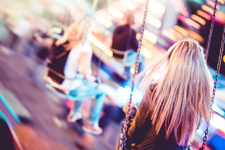Woman on Carousel Swing Ride thumbnail
