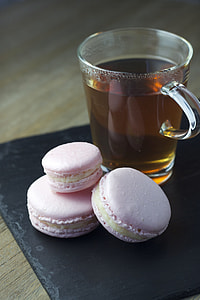 macaroons beside tea mug thumbnail