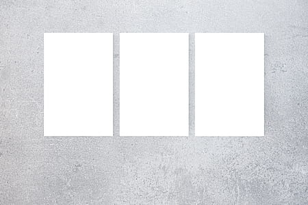 three white printed papers thumbnail