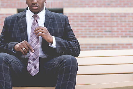 man in black and gray plaid suit set thumbnail