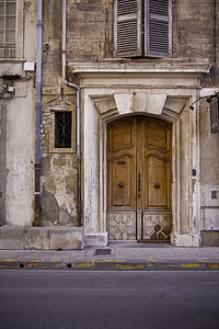 building with brown wooden door thumbnail
