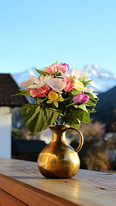 variety of flowers in brass-colored vase closeup photography thumbnail