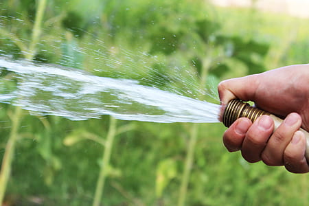 person popping hose of water thumbnail