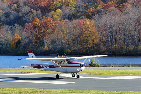 A Cessna single engine private airplane on the tarmac after landing. thumbnail