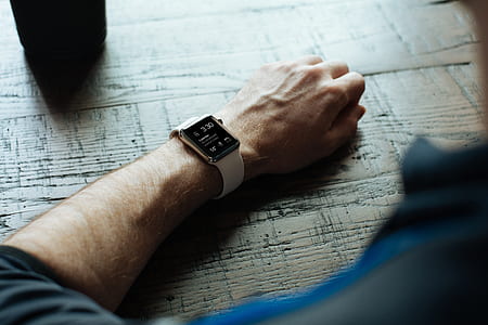 person wearing white smartwatch thumbnail