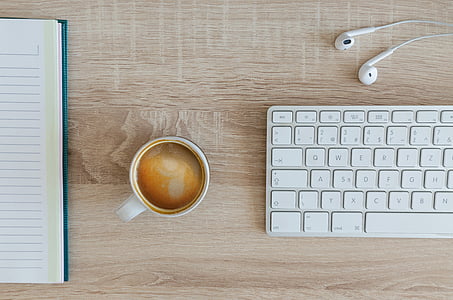 white ceramic cup near white computer keyboard thumbnail