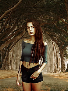 woman in grey crop-op and black shorts photo thumbnail