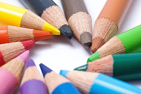 colored pencil arranged with their sharp end forming a circle thumbnail
