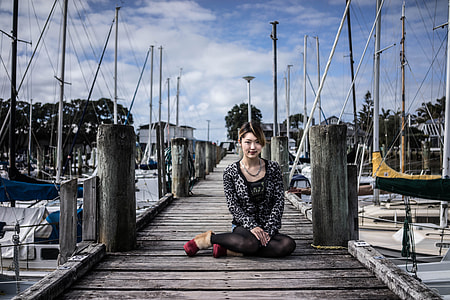 woman sitting on dock thumbnail