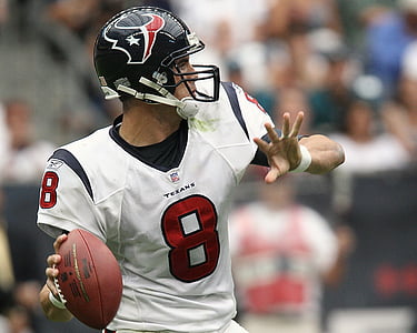 selective focus photography of Houston Texans player playing american football thumbnail