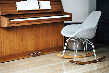 Old piano with sheet music thumbnail