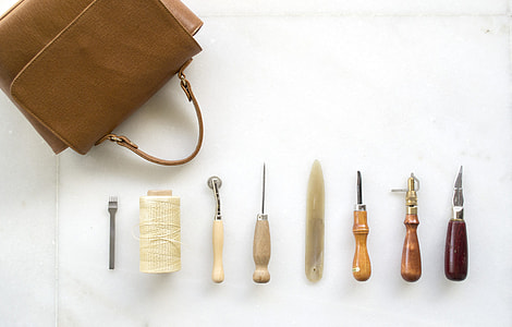 brown-and-stainless steel sculpting tools with leather bag thumbnail