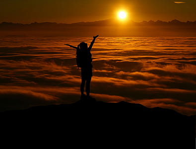 person standing on sea of clouds thumbnail