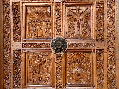 brown wooden door with gray door knocker thumbnail