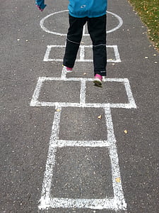 person playing street game during daytime thumbnail